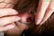 A close up of a woman's pussy with her hands on her pussy.
